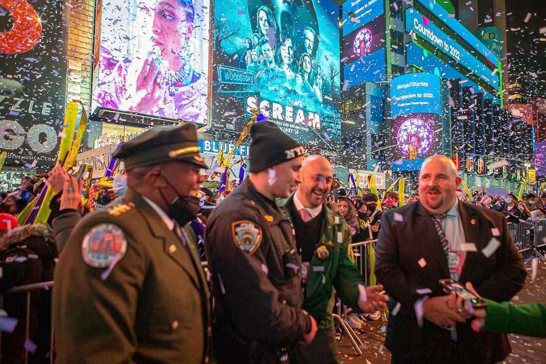 Revelers in Times Square, wearing masked, during the New Year's Eve celebrations to welcome 2022